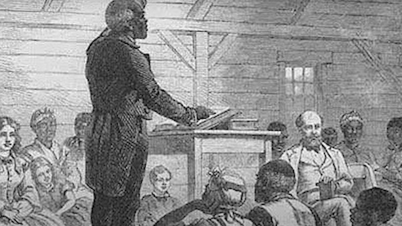 Black-and-white illustration of an African American man standing at a podium addressing a seated group of Black and white individuals in a wooden meeting house, symbolizing a historical moment of teaching or gathering during the Reconstruction era.